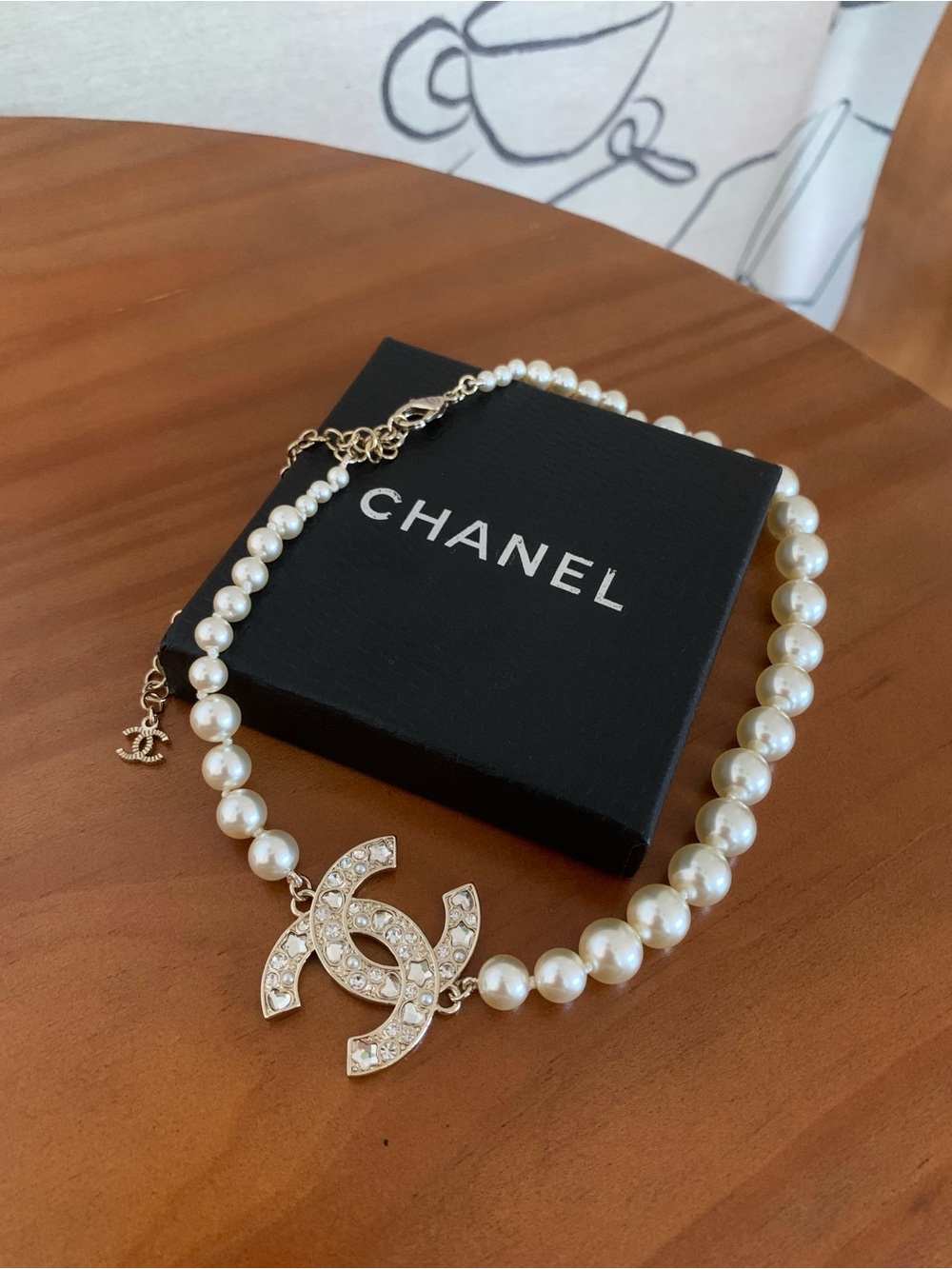 PreownedChanel Pearl Necklace with Gold-Tone Crystal CC Pendant - White Pearls